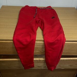 Red Nike Tech Pants